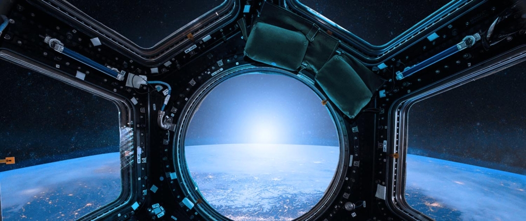 Sunrise from Space Station Porthole